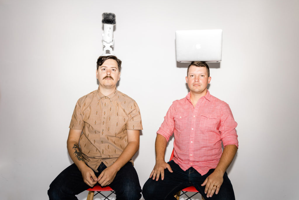 co-owners of Fuel Your Photos, Dylan Howell and Corey Potter. Balancing a podcast mic and laptop on their heads